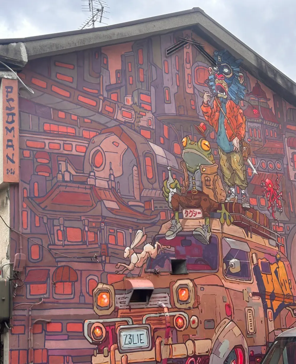 an imaginary city painted from the ground to the roof